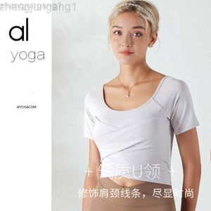 Desginer Alooo Camisa de yoga Ventana Mujer Al Suit Sports Top Womens Expuesto Cinturón de secado rápido Pecho de cofre Melón Fitness transpirable Manga corta