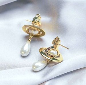 Boucles d'oreilles Design Planet Pearl, pendentif Saturn Pearl, Style de luxe, boucles d'oreilles pour femmes, amour avec bijou Original, 146546