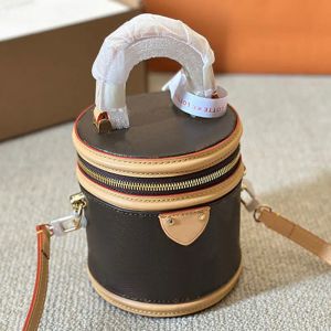 Bolso de diseñador Forma cilíndrica Bolsos de lujo Bolso de mano duro Bolsos de mujer Bolsos de cubo Bolso cruzado de flor vieja Cierre de cremallera Bolsas de viaje Bolsillo para teléfono celular Hombro Ba