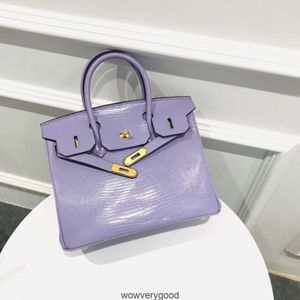 Bolsos de diseñador Totes de moda de lujo Bolso con estampado de lagarto para celebridades femeninas con el mismo temperamento de tendencia francesa bolso grande correa portátil de moda ins vers