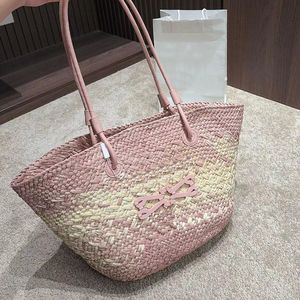 Sacs de plage de créateurs Sac à bandoulière pour femme Totes Mode Été Paille Sac à provisions décontracté Grand panier Sac de vacances tissé Femme Fourre-tout Sac à main Édition limitée Bleu Rose