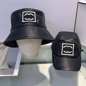 Diseñador Gorra de béisbol negra Mujeres Sombrero de cubo Sombrero de cuero Fedora Hip Hop Hombre Diseñadores Gorras con visera Tendencia PU Casquette Carta Bordado Bonnet