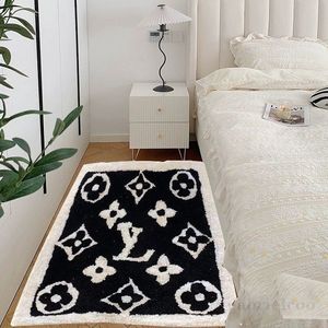 Alfombra de diseño en blanco y negro, alfombra rectangular con logotipo de flor clásica francesa, alfombra junto a la cama, alfombra antiincrustante para decoración del hogar, alfombra con bucle, alfombra para el suelo