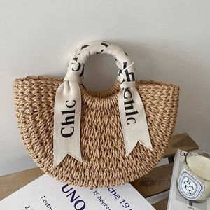 Diseñador Casual Vacaciones Bolsas de playa Carta de hombro Bufanda de seda Bolsa tejida de paja portátil Versátil Semi circular Mujeres S Bolsos de ratán Bolsas de compras Monederos Cartera