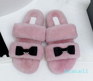 Sandalias clásicas de diseñador con doble botón y lazo, sandalias acolchadas de piel de oveja, suela gruesa, antideslizantes, zapatos de felpa para mujer