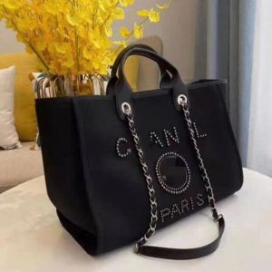 Bolsos de noche clásicos de diseñador Bolso de lujo Moda Perla Marca Etiqueta Mochila Bolsos de playa para mujer Monedero Bolso de mano de lona para mujer CH002