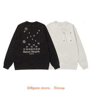 Diseñador Ropa de moda Camisetas para hombre Camiseta Margiela Otoño Nuevo logotipo Bordado Impresión de letras Ajuste holgado Camiseta de manga larga de algodón puro para hombres y mujeres