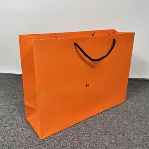 Emballages cadeaux de créateurs Sacs en papier H Boîte d'emballage Sac en papier horizontal et vertical Écharpe en cachemire Sac de boîte-cadeau Sac en carton pour vêtements Sac en papier