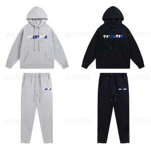 Дизайнерская толстовка с капюшоном Man Autumn Two Piece Set Trapstarr Suits White Blue Letters Полотенце с вышивкой Мягкий свитер Брюки Парный костюм Мужская дизайнерская одежда 0607