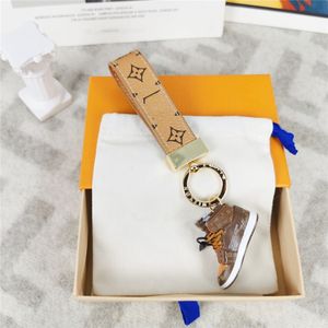 Diseñador Keychain de cuero Lugar de lujo llaves lindos para mujeres bolsos accesorios colgantes multicolor hebilla bebón llavero