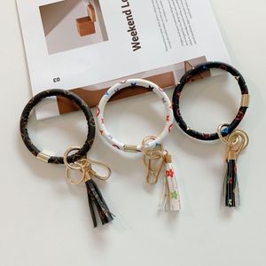 Designer porte-clés portefeuille porte-clés hommes et femmes étui de téléphone lanière bracelet porte-clés mode couple bracelets top cuir pendentif clé