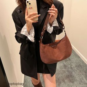 Diseñador Moda de lujo Bolsas de asas Bolsa para mujer Tendencia de la moda Bolsa para mujer Instagram Minimalista y de gran capacidad Bolso de hombro único de piel de venado