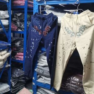 Pantalones para hombre de diseñador Young Thug Star Sp5der 555555 Pantalón azul albaricoque parche patchwork loop pantalones para hombres y mujeres