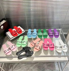 Diseñador Nuevo estilo zapatillas Candy Color para mujeres zapatillas de fondo plano de verano Sándalo de cuero de verano