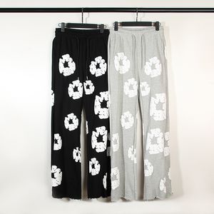 Pantalon de créateur Vintage en mousse tridimensionnelle imprimé Flare Joggers Harajuku brodé large pantalon de survêtement pour hommes et femmes micro évasé