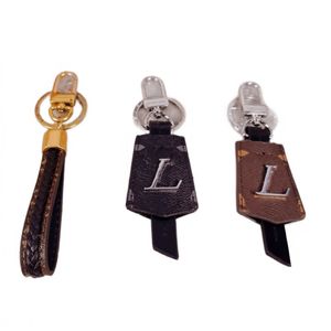 Porte-clés bouclier de luxe en cuir et métal pour voiture, sac à dos, bijoux de haute qualité