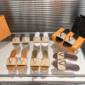 Zapatillas tejidas de paja de diseñador Zapatos de playa de marca para mujer Diapositivas planas Zapatillas de diseñador Chanclas de París Sandalias Deslizador de lujo Bordado Pisos Alpargatas