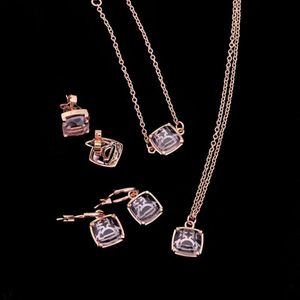 Designer Viviene Westwoods New Viviennewestwood Newempress Dowager Saturn Transparent Collier en verre de sucre Bracelet Boucles d'oreilles Ensemble de bijoux Accessoire de haute qualité