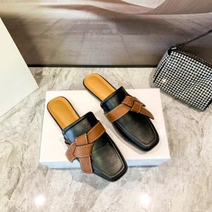 Designer Femmes Sandales Mode Hommes Diapositives Dame Cadeau Porte Talon Plat Calfskin Slipper Classique Cravate En Cuir Chaussures De Plage En Plein Air Casual sandale