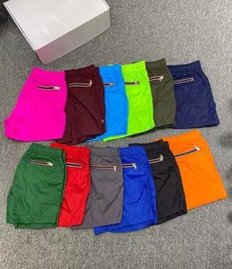 Diseñadores Pantalones cortos para hombre 12 colores Pantalones cortos para hombres y mujeres Verano de secado rápido Pantalones casuales impermeables de cinco puntos Tamaño S --- 3xl Rhid