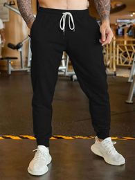 Diseñadores Pantalones deportivos para hombre Marca de moda Hombres Mujeres Pantalones deportivos Pantalones para correr Entrenamiento Correr Pantalones largos Joggers deportivos para hombres