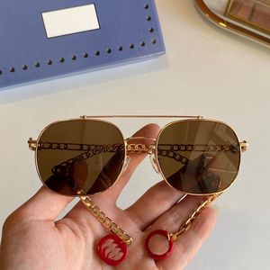 Diseñadores Nuevas gafas de sol polarizadas clásicas para mujer Marca de lujo Marco de metal HD Lentes de vidrio templado Gafas retro Gafas de sol UV400 con caja GG0727S