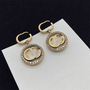 Diamond Circle Ring Eardrop Interior Hollow Light Charm Letras dobles Diseño geométrico Pendientes con caja