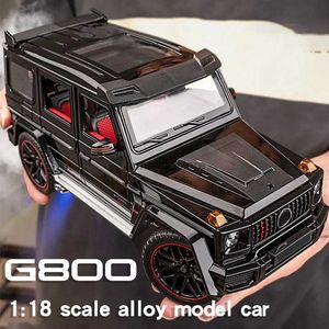 Coches modelo fundido a presión 1/18 Escala fundida G800 Vehículo todoterreno SUV Modelo de aleación Colección de coches Luz de sonido Coche de juguete pulverizable Regalo de cumpleaños para niños 1L23116