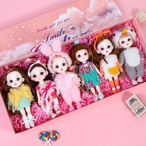 Muñecas BJD Doll 13 articulaciones móviles ojos 3D 6 piezas conjunto de 16 CM moda lindo maquillaje caja de regalo muñeca conjunto niña niño juguete para regalo para niños 230211
