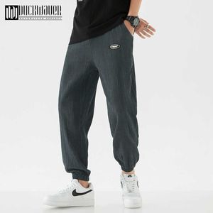 Duckwaver Color sólido Casual tobillo-longitud pantalones marca de calidad hombres moda cordón elástico cintura pantalones lápiz pantalones masculinos 210616