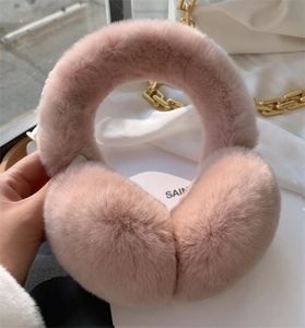 Muffs de la oreja con el conejo de piel de invierno lindos auriculares genuinos reales calientes diademas cálidos vendaje hembra 2210245895081