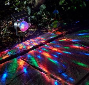 Efectos Lámpara de energía solar Proyector LED Luz Colorida Giratoria Jardín al aire libre Césped Hogar Patio Decoración navideña64127612911043