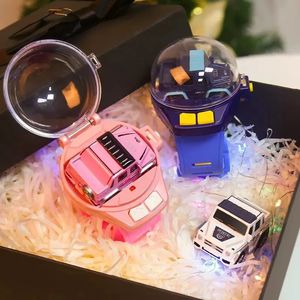 Montre de voiture électrique/RC télécommande voiture Mini 2.4G petit véhicule montre-bracelet dessin animé électrique RC voiture jouets USB charge pour enfants enfants cadeau 231130