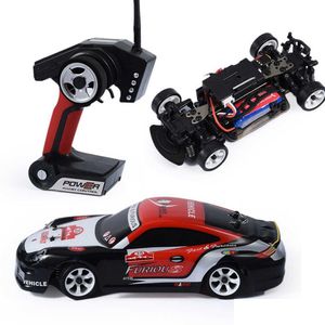 Coche eléctrico / Rc Wltoy K969 1/28 2.4G 4Wd 130 Motor de cepillo de control remoto Alta calidad 30 Km / H Velocidad Drift para niños Regalos T221214 Drop Dhtbo