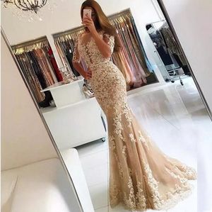 Elegante 2021 Champagne Lace Mermaid Vestidos de baile Sheer Half Sleeves Backless Illusion Jewel Neck Vestidos de noche formales Use vestidos de fiesta