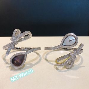 Dame élégante Full Diamond Quart Watch Bowknot Ruban Design Goutte D'eau Cadran Nacre Shell Montre-Bracelet PARIS Montres