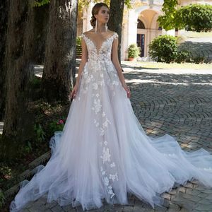 Élégant col transparent une ligne robes De mariée dentelle Appliques perle robe De mariée voir à travers le bouton dos Vestidos De Novia pour la mariée