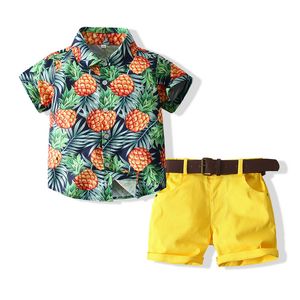 Niños europeos y americanos conjuntos al por mayor de verano de moda de manga corta de manga corta camiseta impresa + pantalones casuales florales de dos piezas de dos piezas Playa para niños