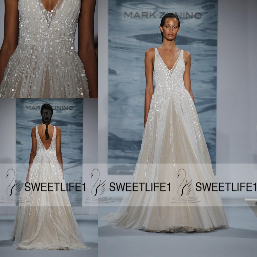 2020 Mark Zunino Wedding Dresses Deep V Neck Sequins Backless Sexy Floor Length A Line Bridal Gowns Bride Dresses, Champagne
2020 Mark Zunino Wedding Dresses Deep V Neck Sequins Backless Sexy Floor Length A Line Bridal Gowns Bride Dresses, Champagne