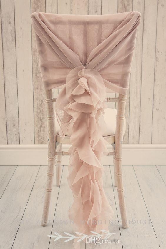 vintageinspired blush pink chair covers with fashionable ruffled sashes for weddings