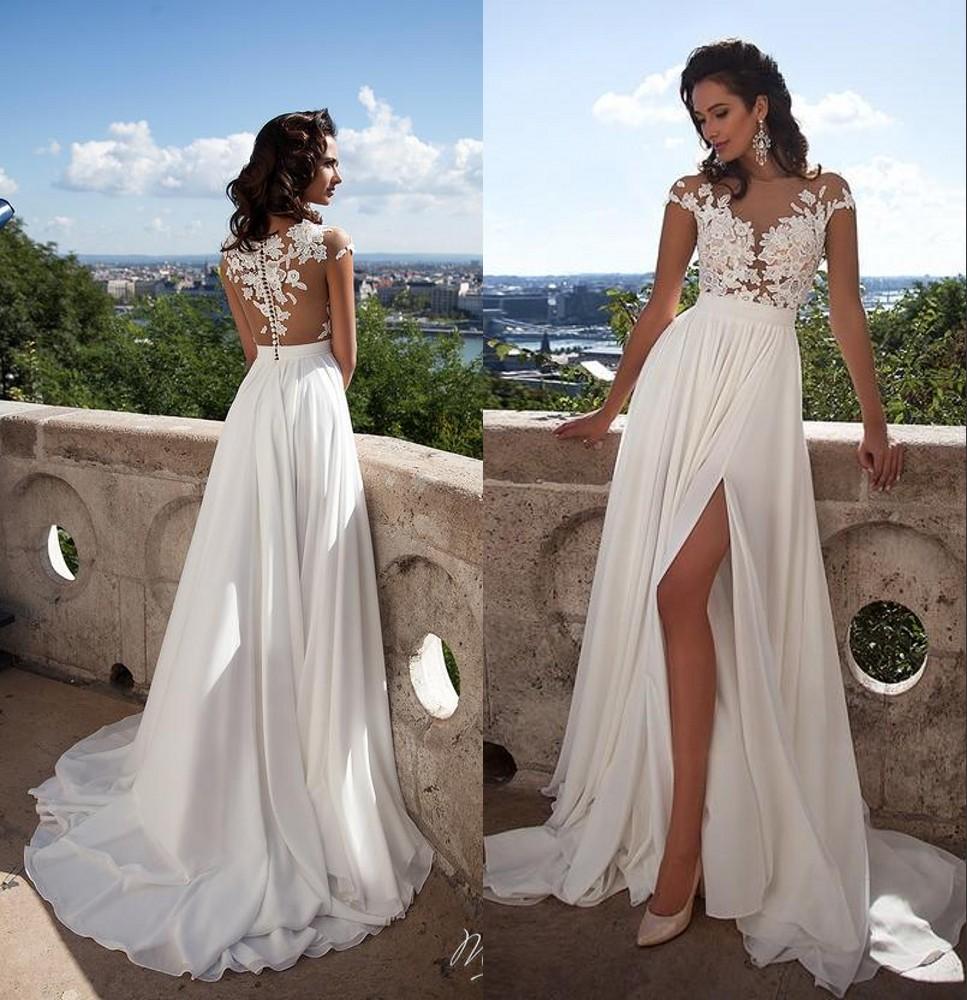 2019 Sexy Sheer Lace Appliqued A Line Wedding Dresses with Capped Sleeves High Split Side Beach Bridal Gowns, Custom made from color chart
2019 Sexy Sheer Lace Appliqued A Line Wedding Dresses with Capped Sleeves High Split Side Beach Bridal Gowns, Custom made from color chart