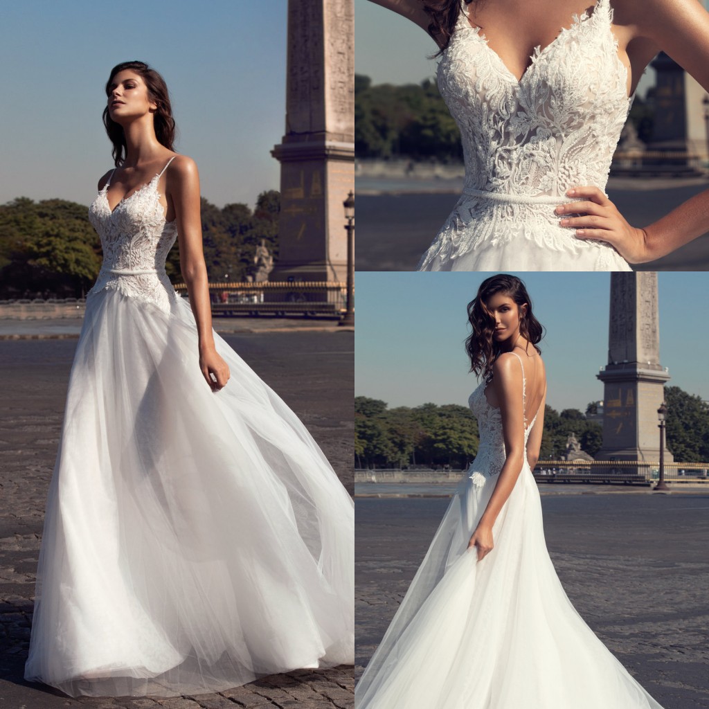 Fashion A Line Wedding Dresses Sexy V Neck Illusion Sleeveless Lace Appliques Bridal Gowns Sweep Train Beach Wedding Dress robes de mariée
