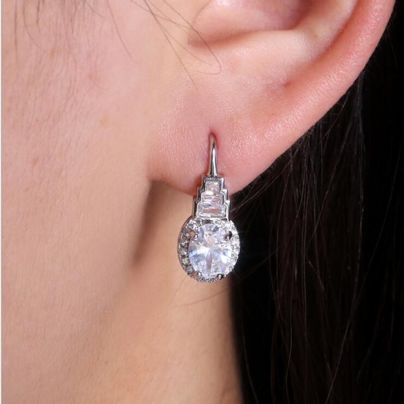 Top-Selg Vintage Jewelry: Oval Cut White Topaz Dangg Earrings in Sterg Sier for Women