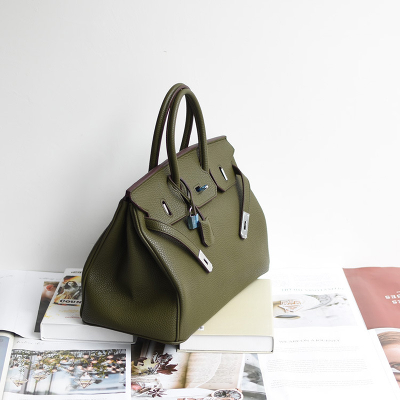 European and American fashion style factory Spot 35cm PU embossed leather handbags hand carry bags shall be given OEM