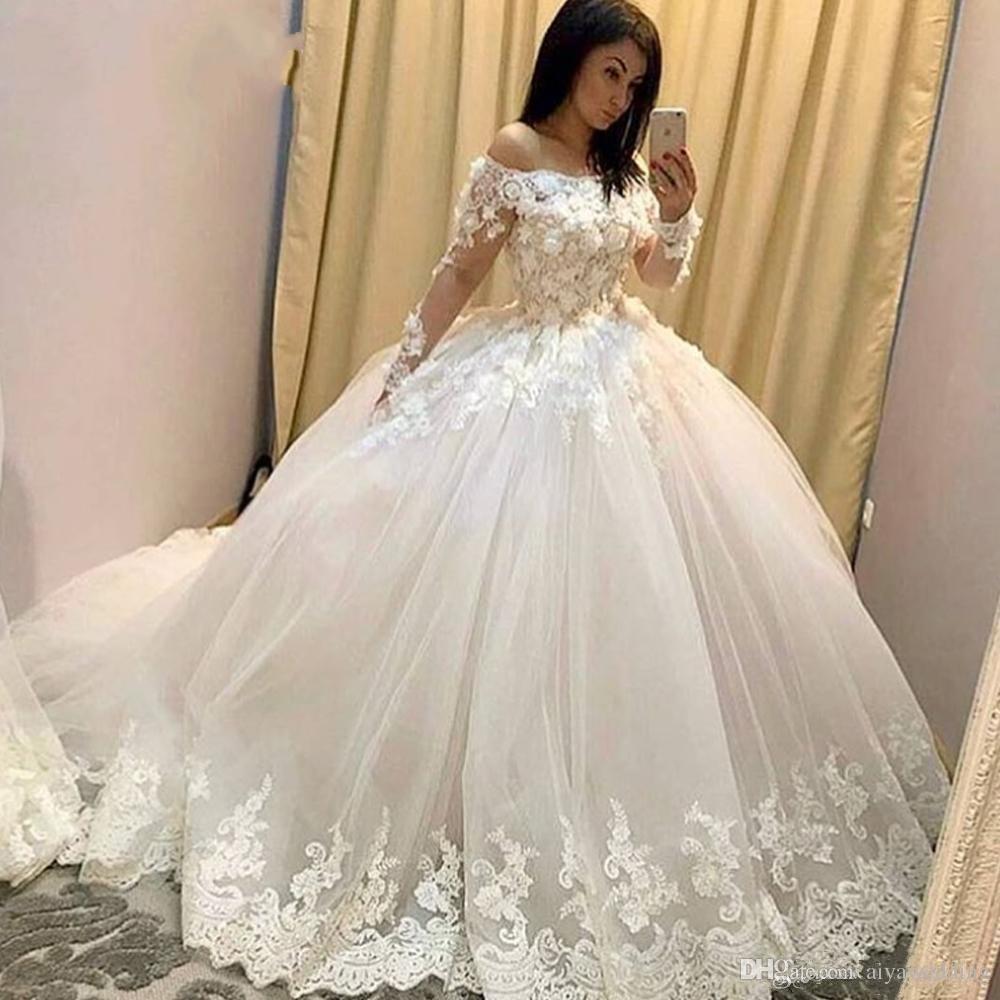 2020 Ball Gown Wedding Dresses Illusion Long Sleeve Lace Appliques Hand Made 3D Flowers Floor Length Bridal Dresses Arabic gown, Champagne
2020 Ball Gown Wedding Dresses Illusion Long Sleeve Lace Appliques Hand Made 3D Flowers Floor Length Bridal Dresses Arabic gown, Champagne