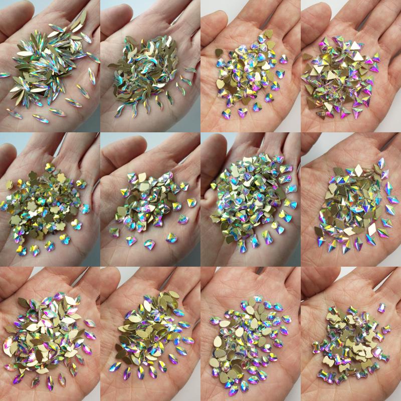 72pcs Strass AB Rhinestones Decoration For Nail Flat Shaped Elongated Teardrop Triangle Designs Nails Art Bows Stone 
72pcs Strass AB Rhinestones Decoration For Nail Flat Shaped Elongated Teardrop Triangle Designs Nails Art Bows Stone