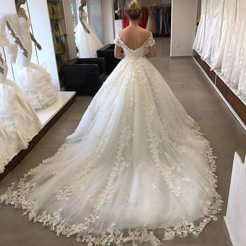 Princess Ball Gown Wedding Dresses Off Shoulder Lace Appliques Short Sleeve Bridal Gowns Sweep Train robes de soirée