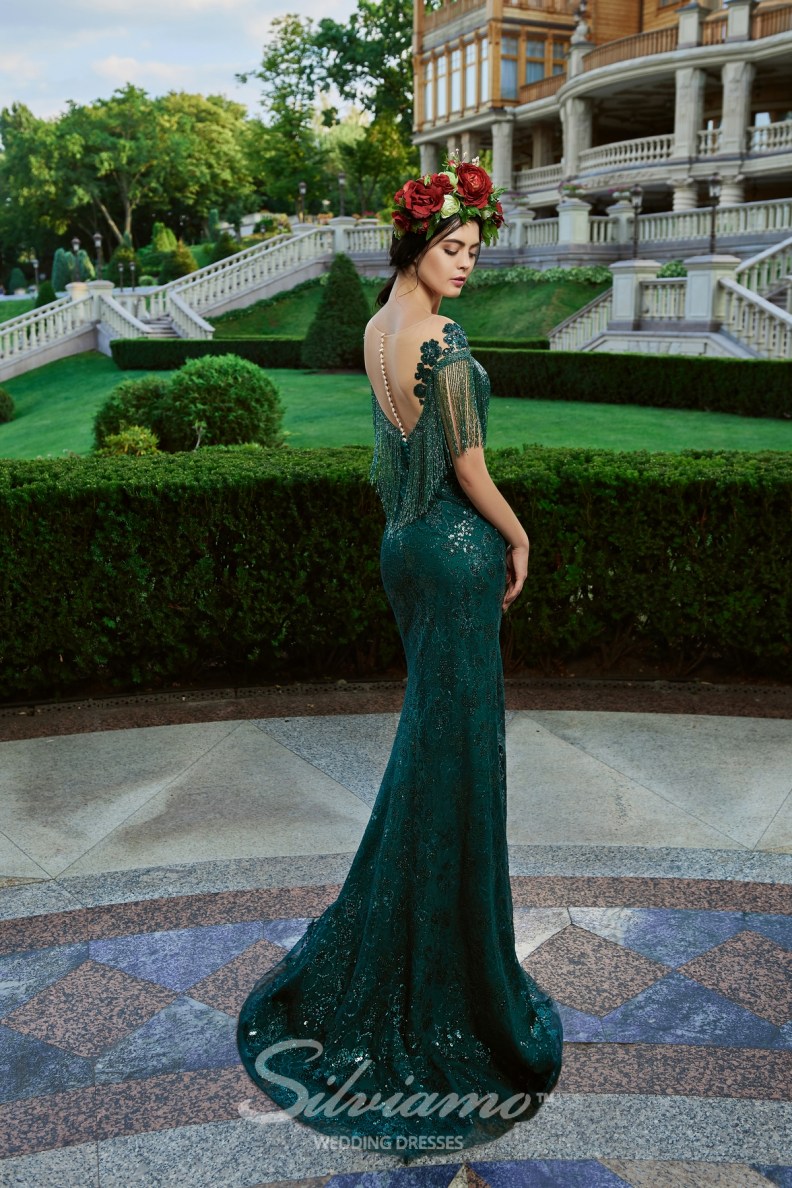 2020 Mermaid Evening Dresses Sheer Neck Appliqued Sequins Tassel Sleeveless Prom Gown Sheer Back Ruffle Sweep Train Formal Party Gown
