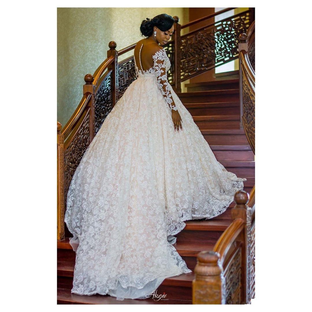 Sexy African A Line Wedding Dresses Scoop Neck Illusion Full Lace Pearls Beaded Long Sleeves Chapel Train Ball Gown Formal Bridal Gowns