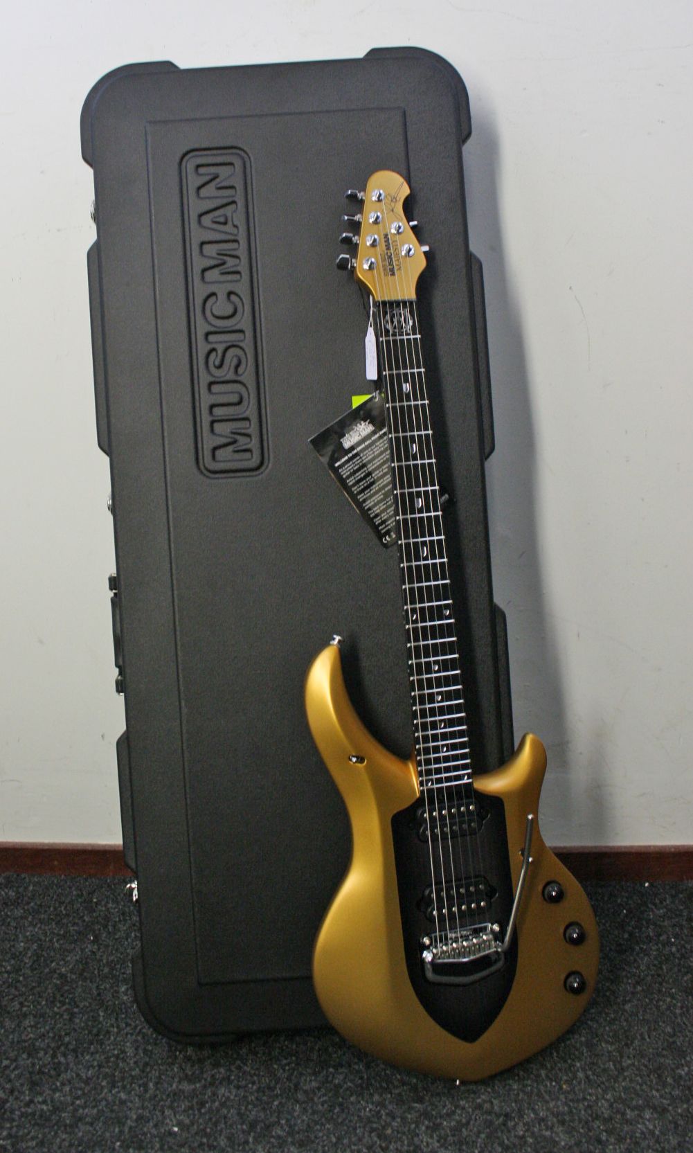Custom Ernie Ball Music Man John Petrucci Majesty Gold Mine (Black Center) Electric Guitar Tremolo Bridge, Active Pickups & 9V Battery Box
Custom Ernie Ball Music Man John Petrucci Majesty Gold Mine (Black Center) Electric Guitar Tremolo Bridge, Active Pickups & 9V Battery Box